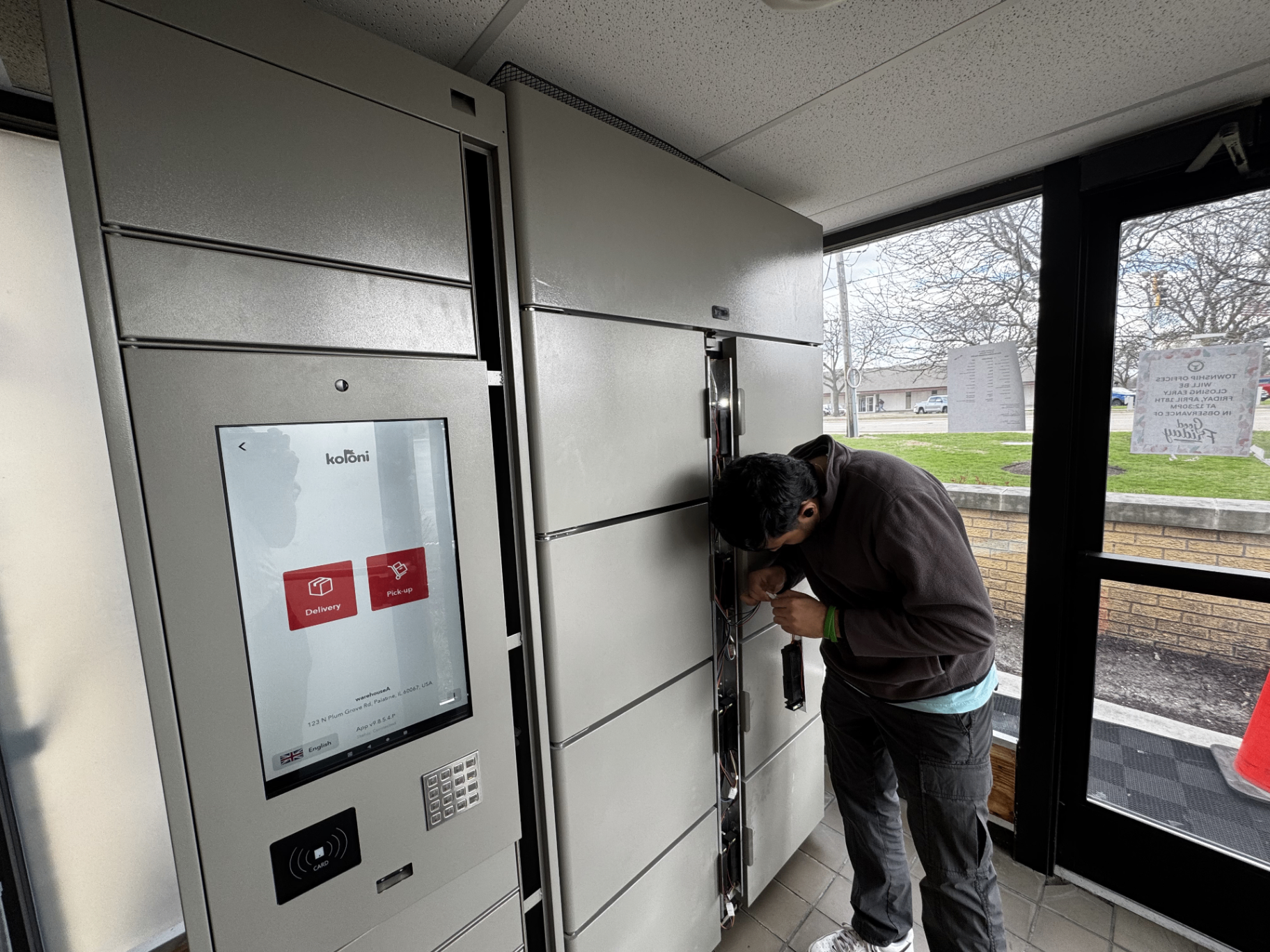 Technician installing smart locker system