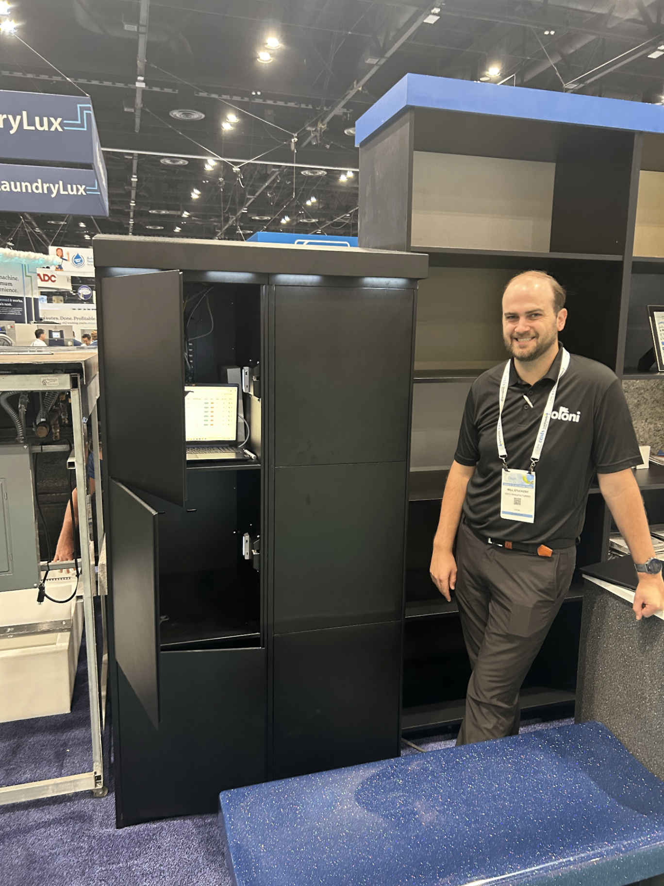 Accessa team showcasing smart locker solutions at a trade show